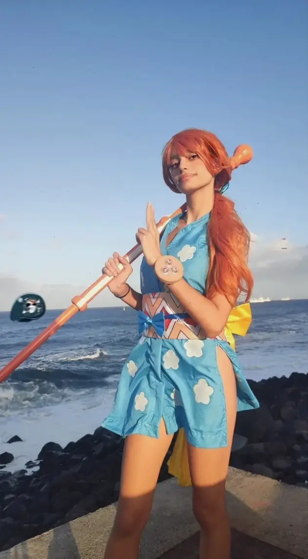Ảnh Anime Nami: Bộ sưu tập hình đẹp từ One Piece, thể hiện sự dễ thương và mạnh mẽ của cô nàng.